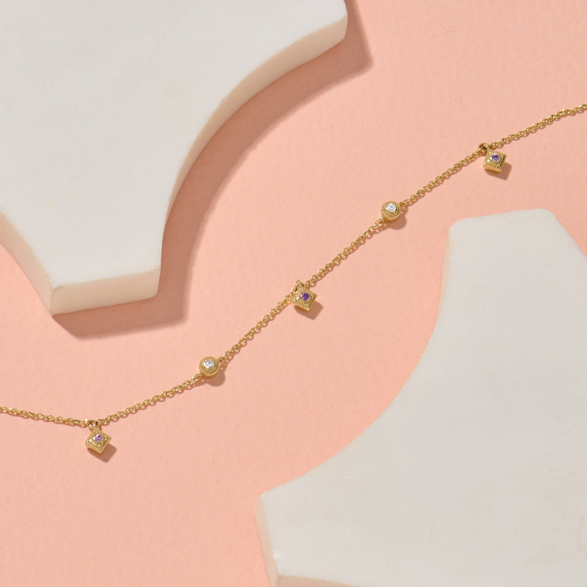 Amethyst and CZ Talisman Bracelet in Solid Yellow Gold