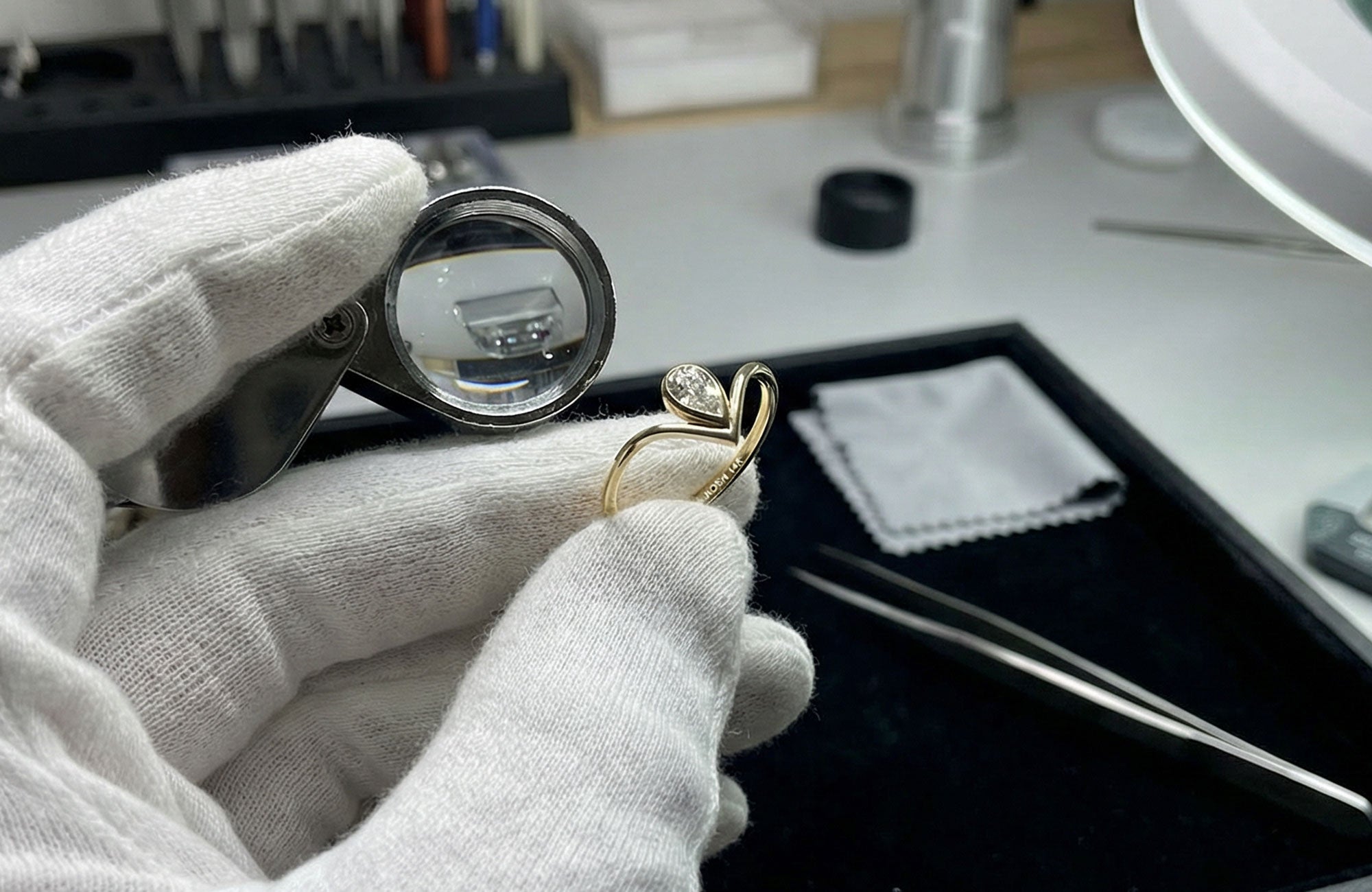 Bespoke Solid Gold Ring Being Inspected