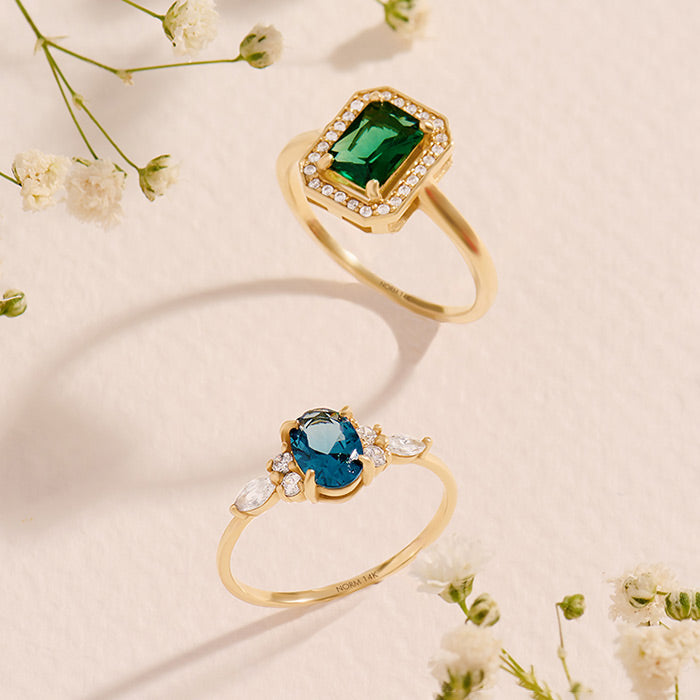 Norm Emerald and Sapphire Gemstone Rings in Solid Gold