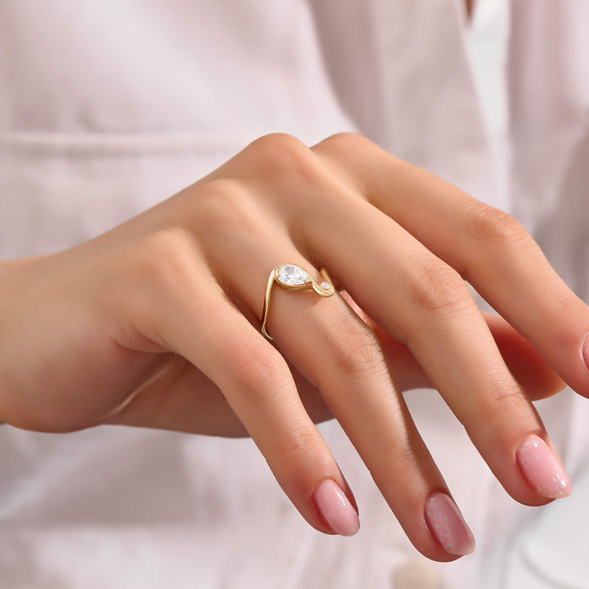 Women's Moissanite Pear Solitaire Swirl Ring in Real Yellow Gold