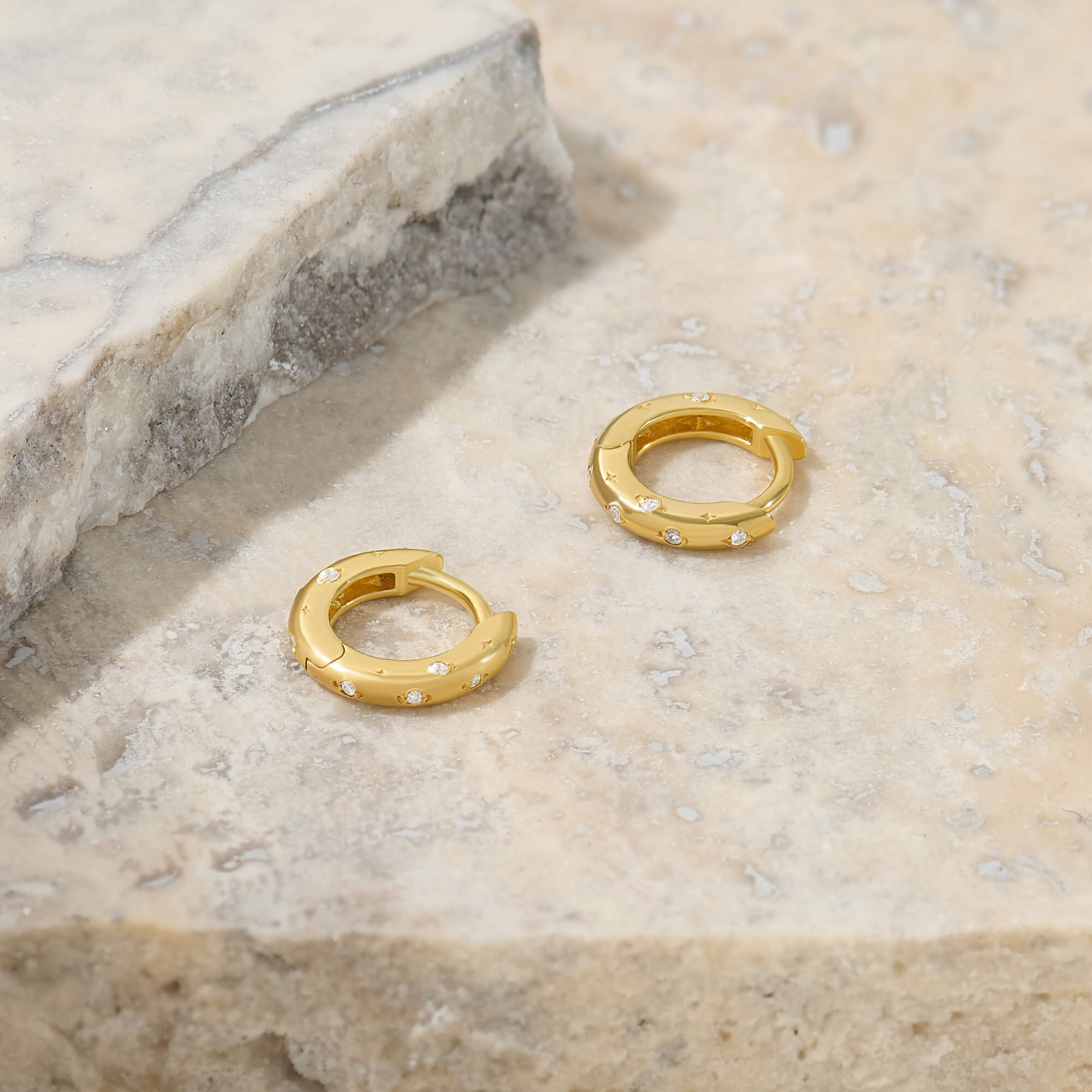 CZ Paved Star Huggie Earrings in 24K Gold Plated Vermeil on 925 Solid Silver