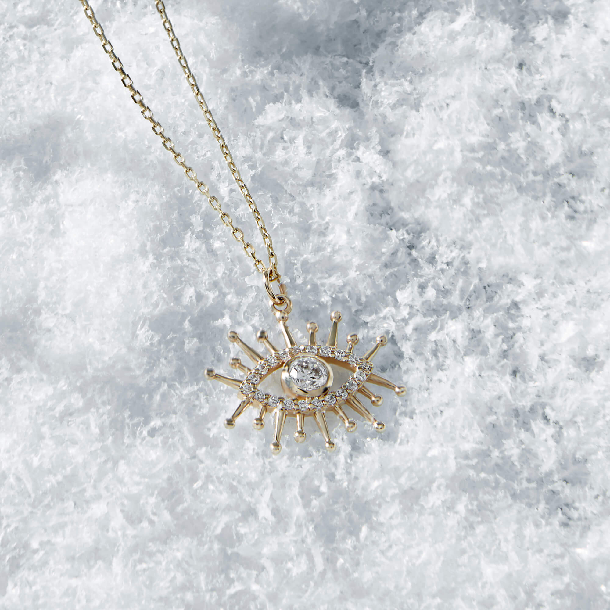 Evil Eye Pendant Paved with Cubic Zirconia in 14k Yellow Gold