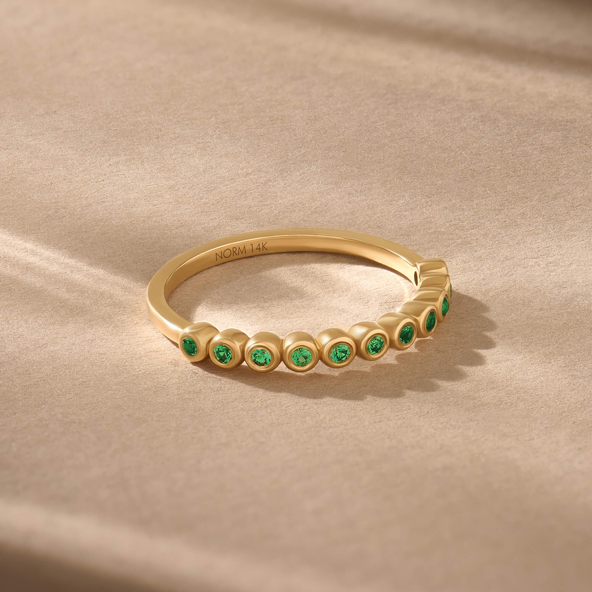 Solid Gold Bezel Emerald Band