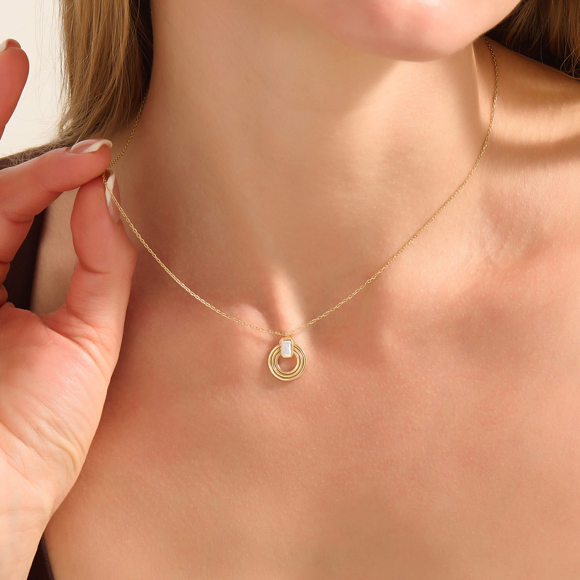 Women's Orbit Loop Necklace in Solid Gold with Emerald-Cut Moissanite