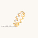 Moissanite Twirl Ring in Solid Gold