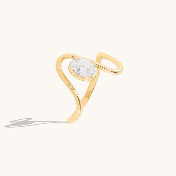 Oval Moissanite Solitaire Swirl Ring in Solid Gold