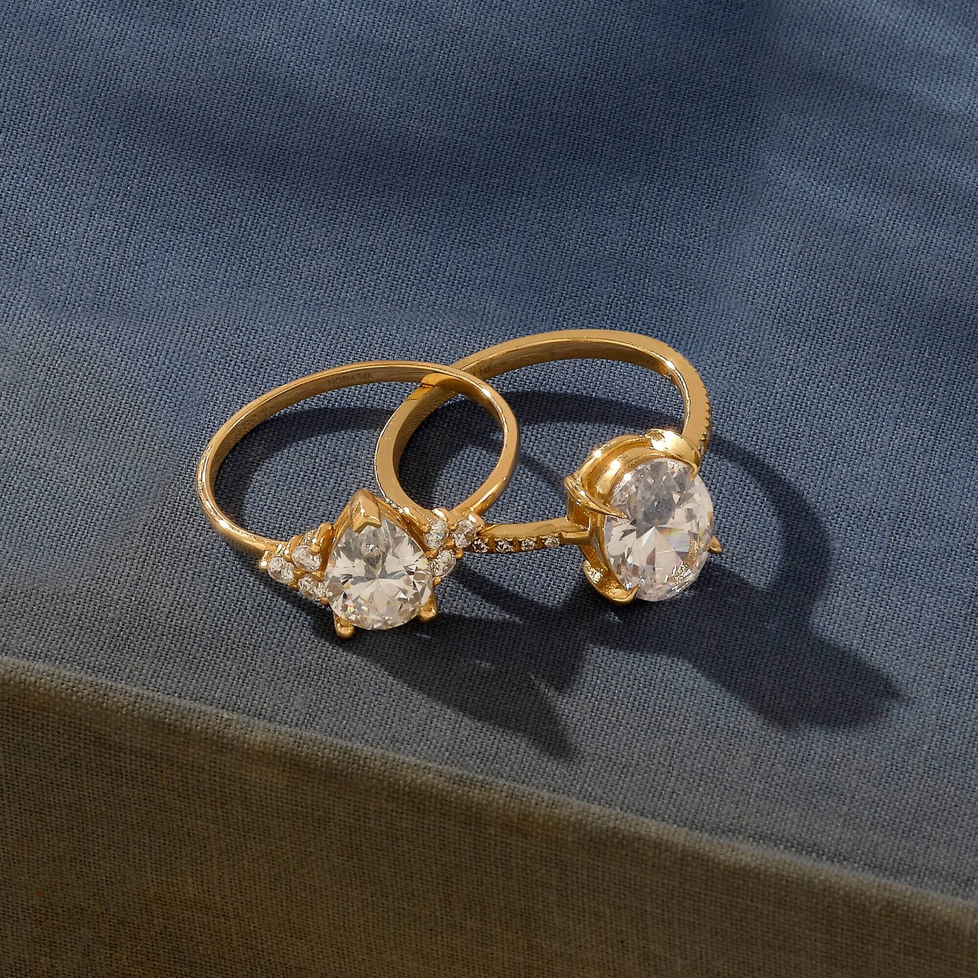Pear and Oval Cut Moissanite Engagement Rings in Solid Gold
