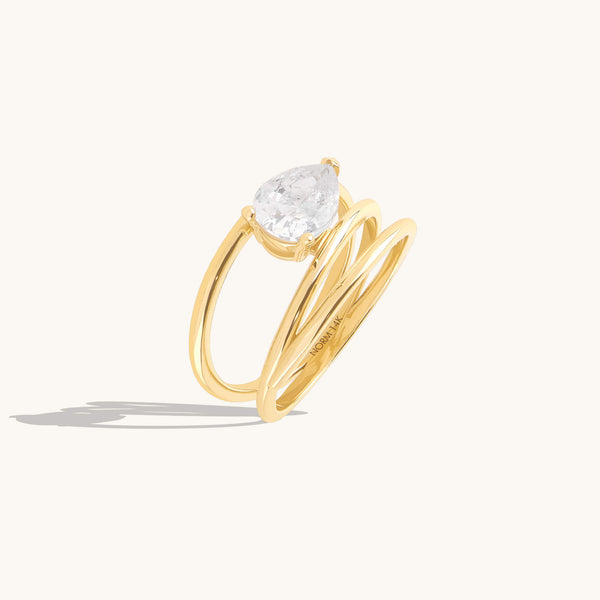 Pear Moissanite Solitaire Spiral Ring in Solid Gold