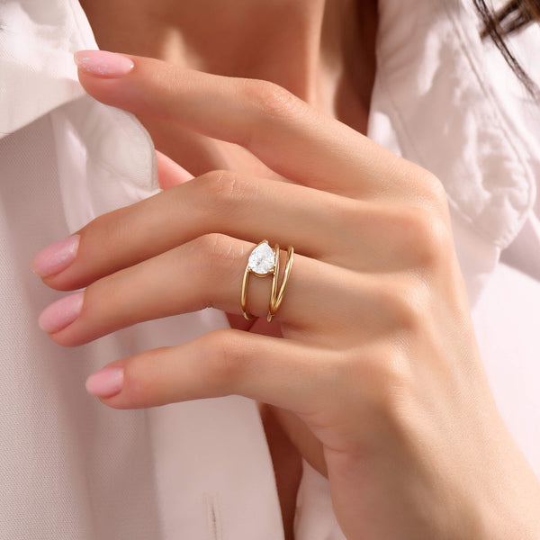 Women's Pear Moissanite Solitaire Spiral Ring in Solid Gold