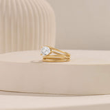 Pear Moissanite Solitaire Spiral Ring in Yellow Gold