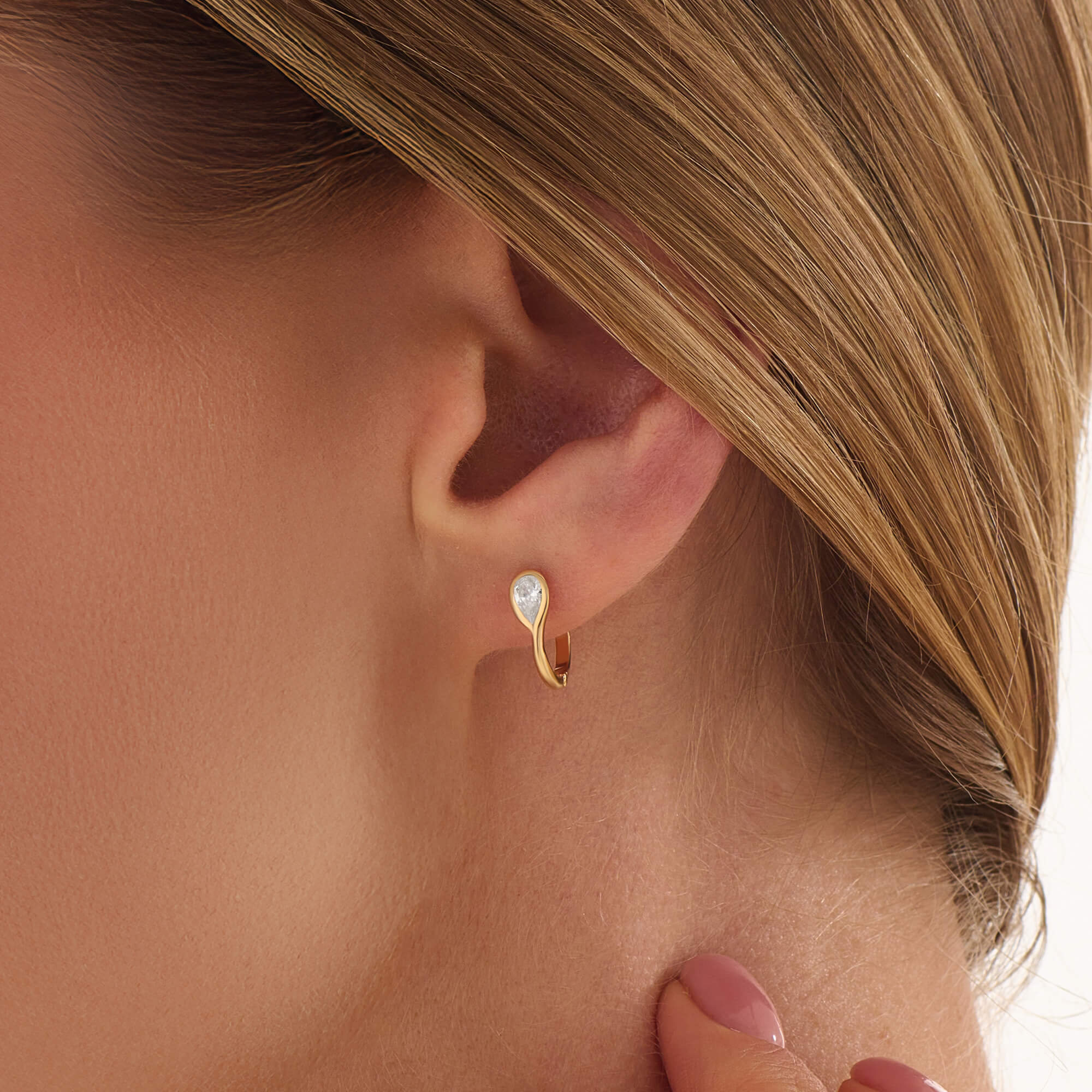 Women's Pear Solitaire Huggie Earrings in Gold Vermeil