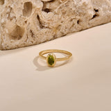 Oval Peridot Solitaire Ring in 14K Gold