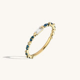 Solitaire Baguette Eternity Ring Paved with Blue CZ Stones in Gold