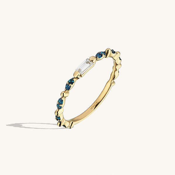 Solitaire Baguette Eternity Ring Paved with Blue CZ Stones in Gold