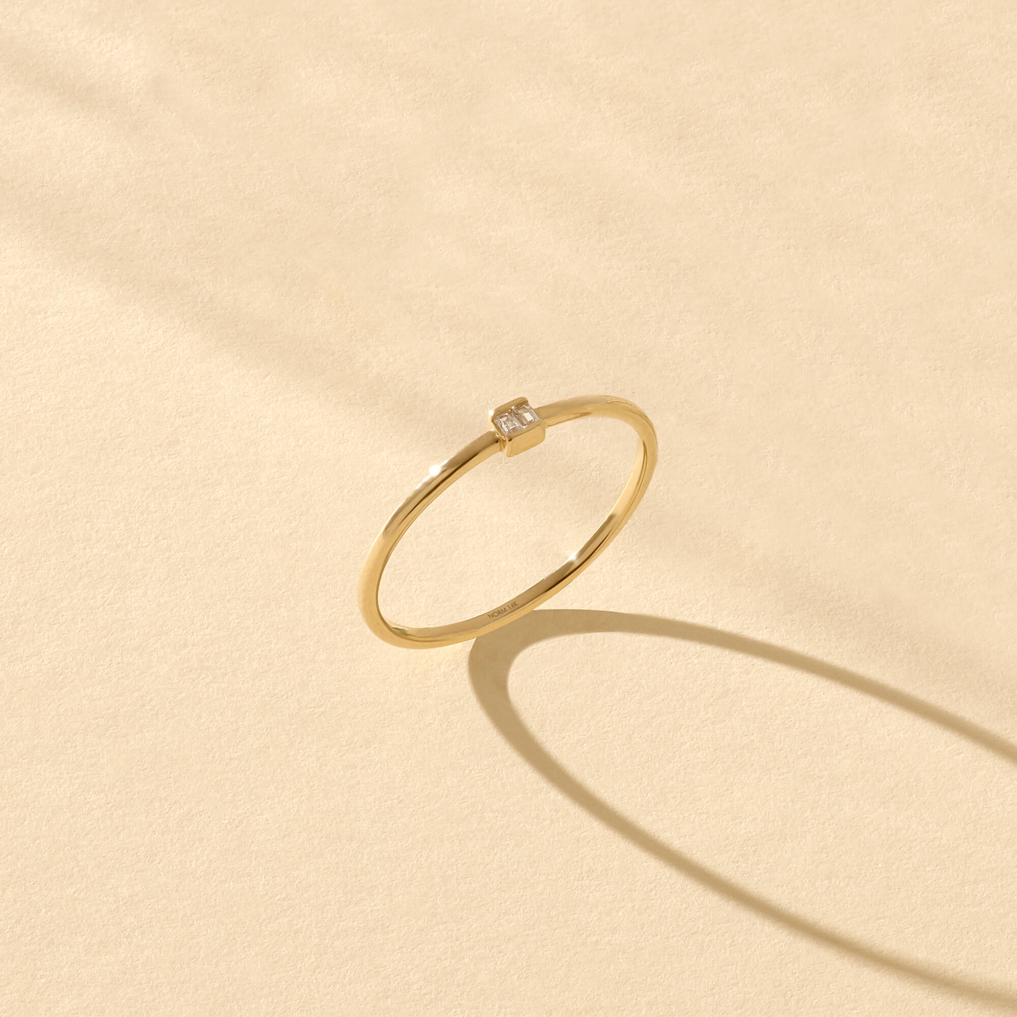 Dainty Baguette Solitaire Ring in Gold