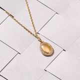 14k Gold Oval Signet Pendant Paved with Cubic Zirconia