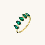 Dainty 5 Stone Oval Cut Emerald Ring in Gold